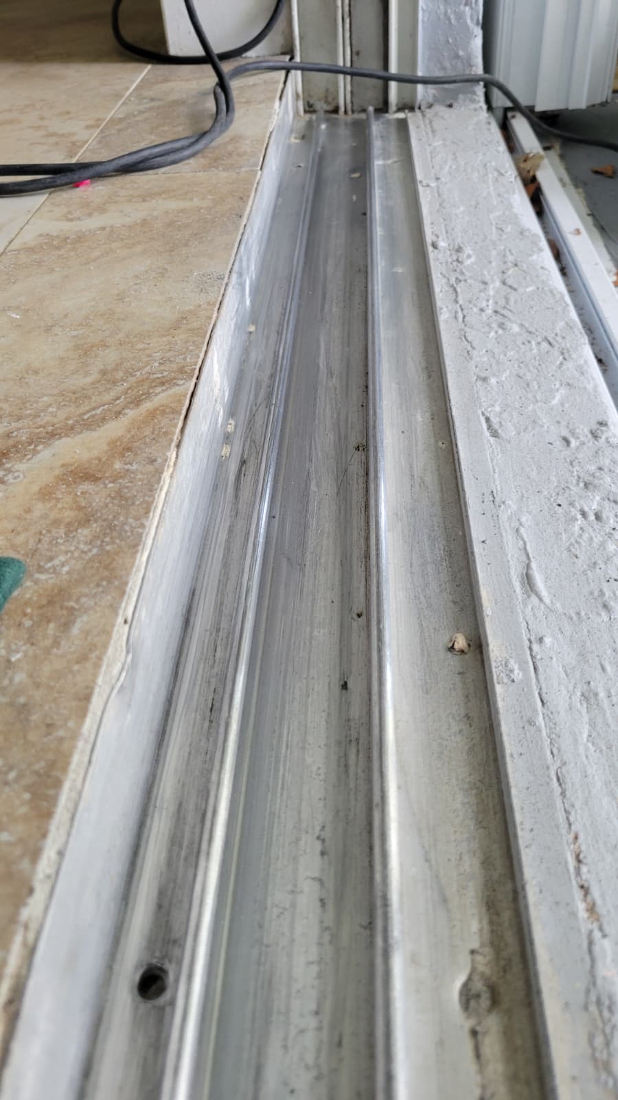 Sliding glass door track repair